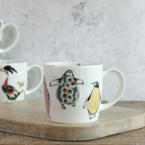 The Dancing Penguins Mug by Anna Wright
