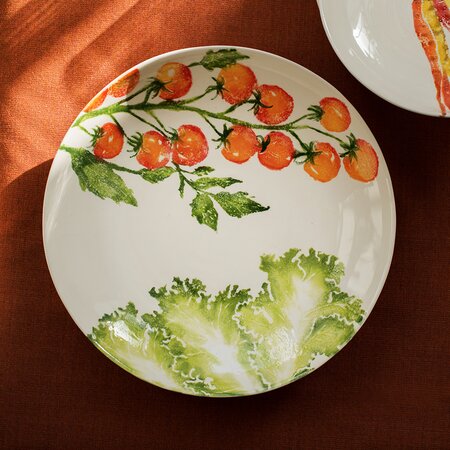 Vine Tomatoes and Lettuce Leaves Serving Dish